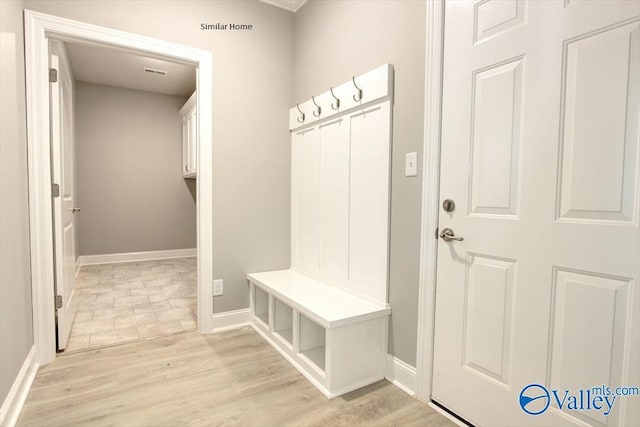 mudroom with light wood-type flooring