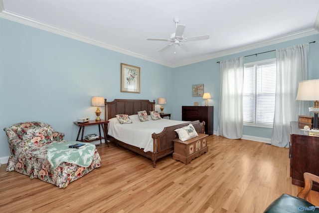 bedroom featuring light hardwood / wood-style flooring, ornamental molding, and ceiling fan