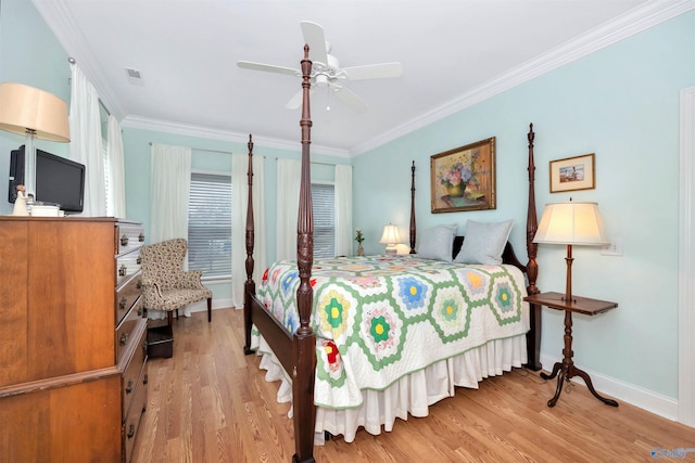 bedroom with crown molding, ceiling fan, and light hardwood / wood-style flooring