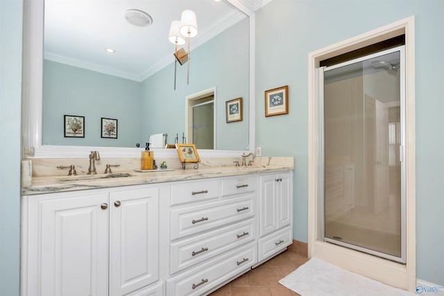 bathroom featuring vanity, crown molding, tile patterned floors, and walk in shower