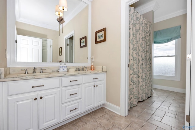 bathroom featuring ornamental molding and vanity