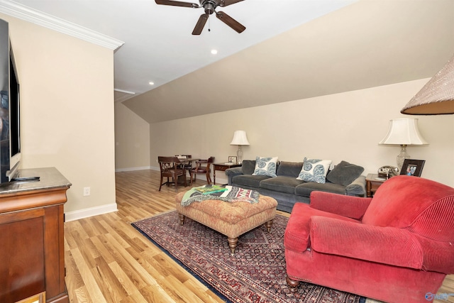 living room featuring ceiling fan, lofted ceiling, and light wood-type flooring