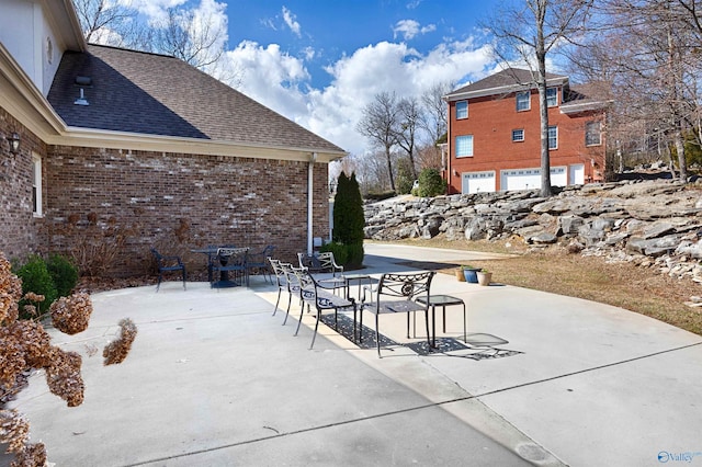 view of patio / terrace with a garage