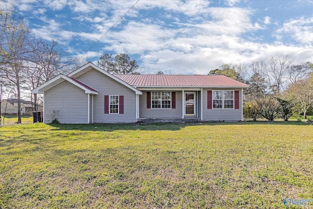 ranch-style house featuring a front lawn