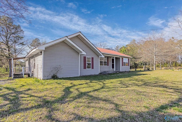 exterior space with a lawn