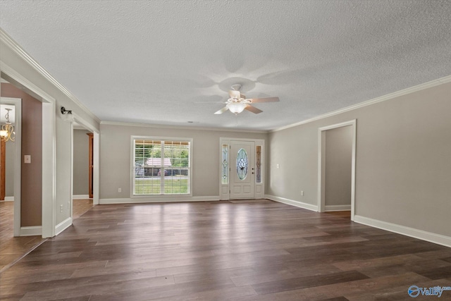 interior space featuring ornamental molding, a textured ceiling, a ceiling fan, and dark wood-style flooring