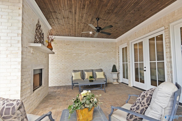 view of patio / terrace with french doors and ceiling fan