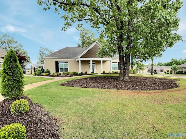 view of front facade with a front yard