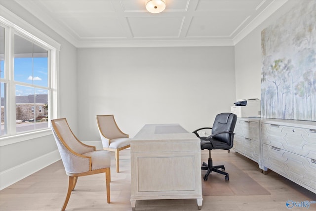 office with light hardwood / wood-style floors, ornamental molding, and coffered ceiling