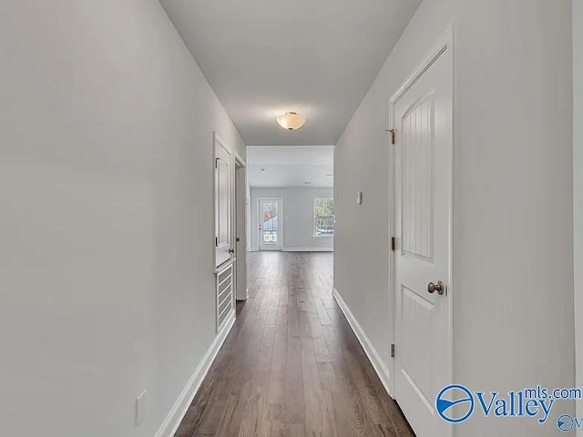 hall featuring dark hardwood / wood-style floors