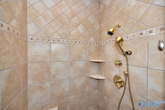 details featuring a tile shower