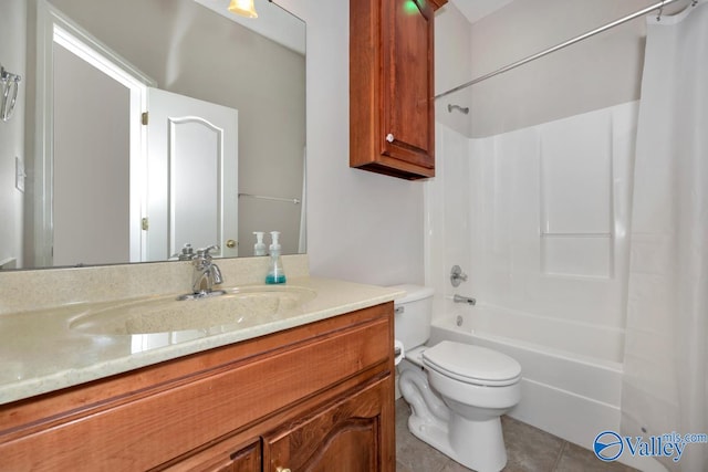 full bathroom with tile patterned floors, shower / bath combo, toilet, and vanity