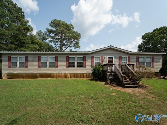 manufactured / mobile home with a front yard