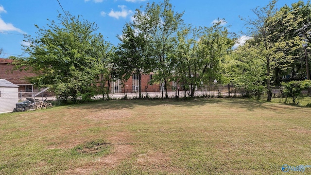 view of yard featuring fence