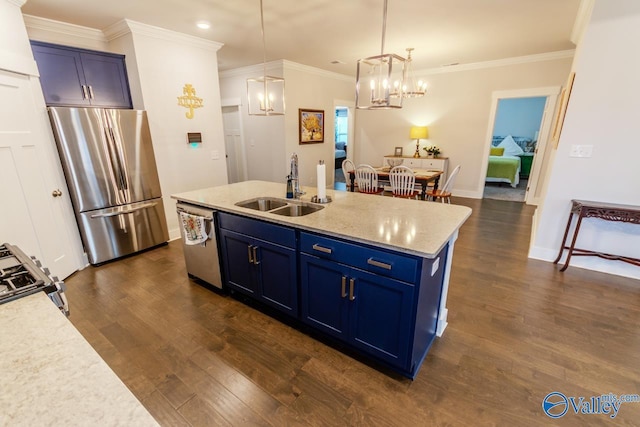 kitchen featuring blue cabinetry, sink, dark hardwood / wood-style floors, a center island with sink, and appliances with stainless steel finishes