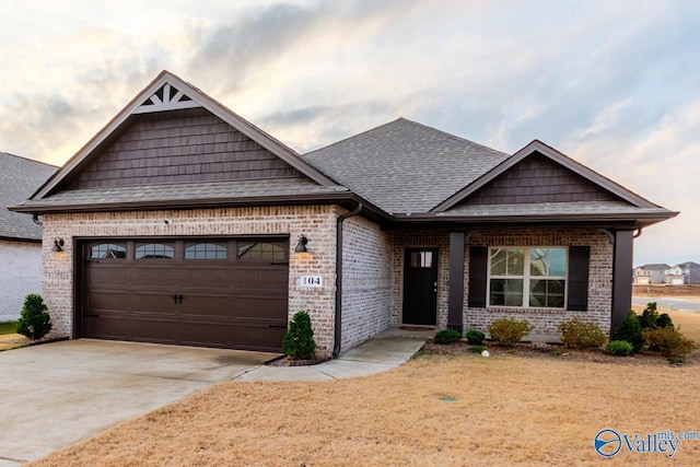 craftsman house with a garage