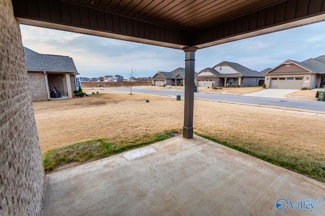 view of yard with a garage