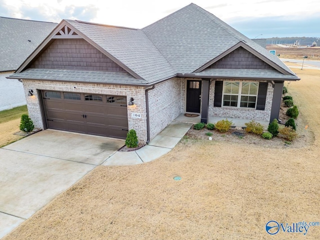 craftsman inspired home with a garage