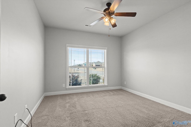 carpeted empty room with ceiling fan