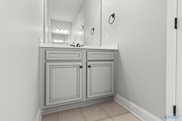 bathroom with vanity and tile patterned flooring