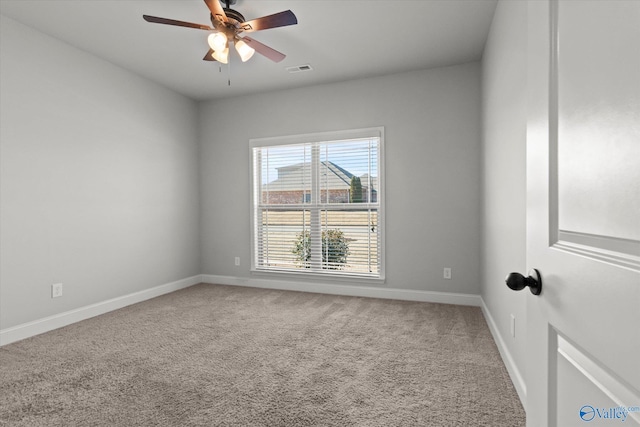 carpeted empty room with ceiling fan