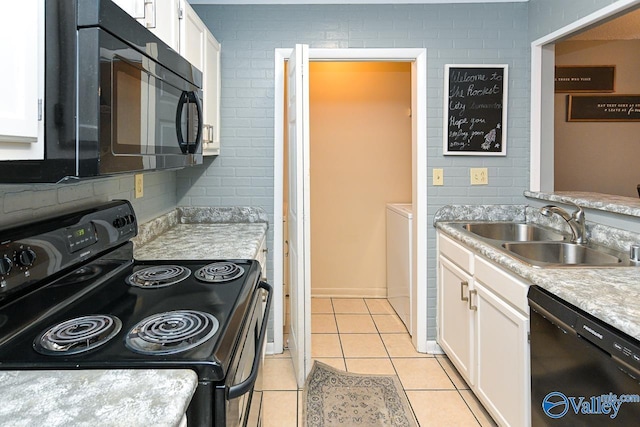 4967 Seven Pine Cir Unit 4967, Huntsville, AL 35816 - kitchen featuring black appliances, a sink, white cabinets, and light tile patterned flooring