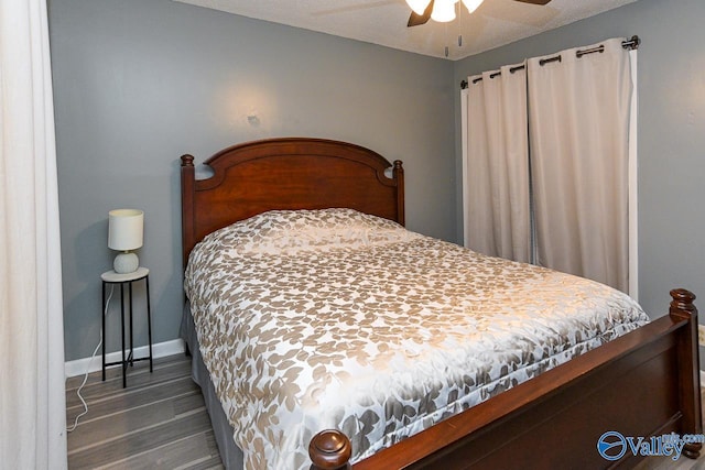 4967 Seven Pine Cir Unit 4967, Huntsville, AL 35816 - bedroom with wood finished floors, baseboards, and ceiling fan