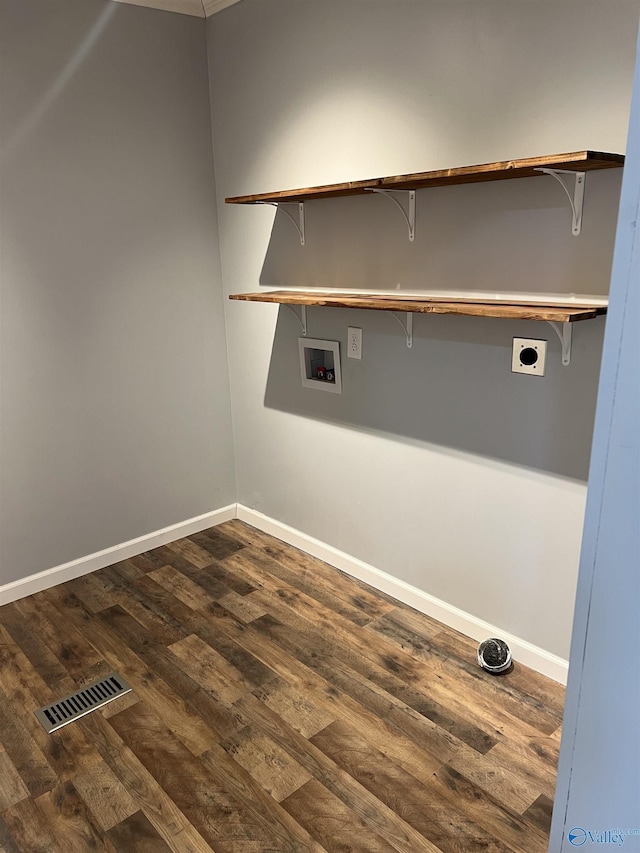 laundry room with dark wood-type flooring, washer hookup, and hookup for an electric dryer