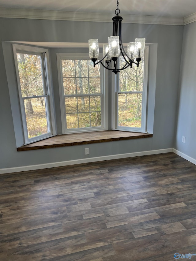 unfurnished dining area featuring crown molding, a chandelier, and dark hardwood / wood-style flooring