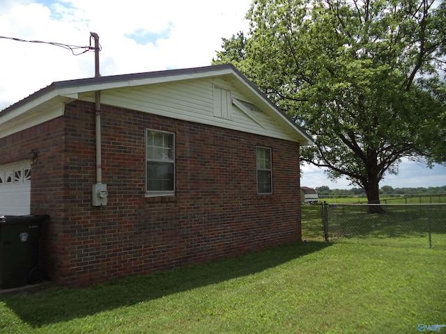 186 Brady Dr, Hazel Green, AL 35750 - view of side of home featuring brick siding and a garage