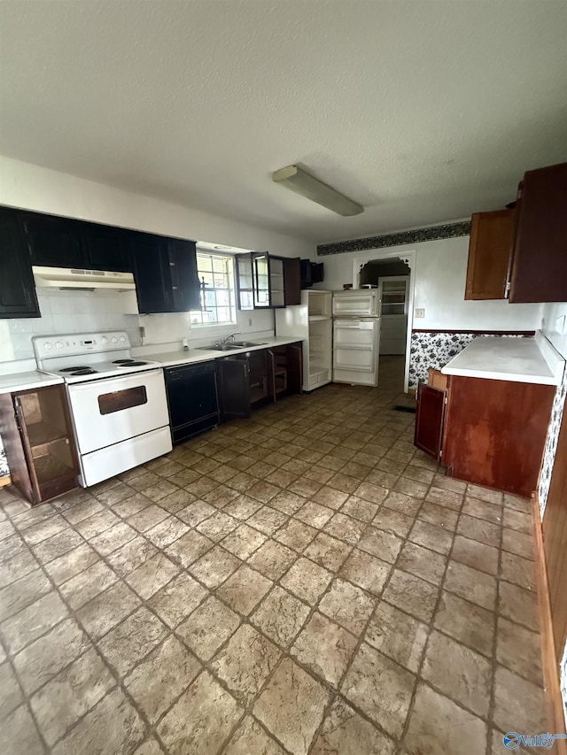 186 Brady Dr, Hazel Green, AL 35750 - kitchen with electric stove, light countertops, under cabinet range hood, backsplash, and a textured ceiling