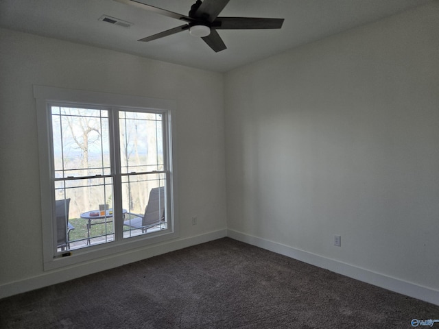 carpeted empty room with ceiling fan