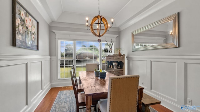 1943 Old Big Cove Rd SE, Owens Cross Roads, AL 35763 - dining room featuring a decorative wall, a chandelier, wood finished floors, a wainscoted wall, and crown molding