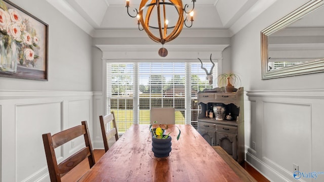 1943 Old Big Cove Rd SE, Owens Cross Roads, AL 35763 - dining space with a chandelier, a decorative wall, a wainscoted wall, wood finished floors, and a tray ceiling