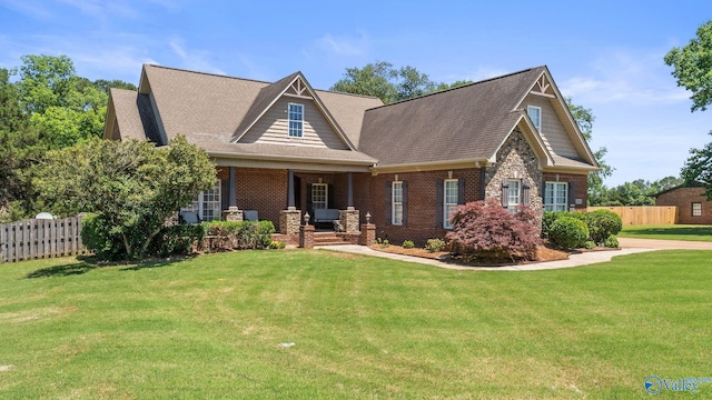 1943 Old Big Cove Rd SE, Owens Cross Roads, AL 35763 - craftsman inspired home featuring a porch, brick siding, and roof with shingles