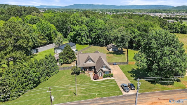 1943 Old Big Cove Rd SE, Owens Cross Roads, AL 35763 - aerial view of property and surrounding area featuring a mountain backdrop and a forest