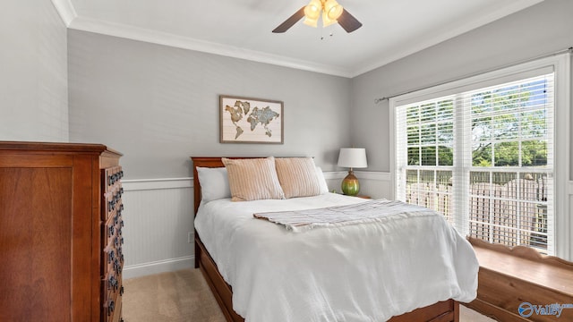1943 Old Big Cove Rd SE, Owens Cross Roads, AL 35763 - bedroom featuring ornamental molding, wainscoting, and a ceiling fan