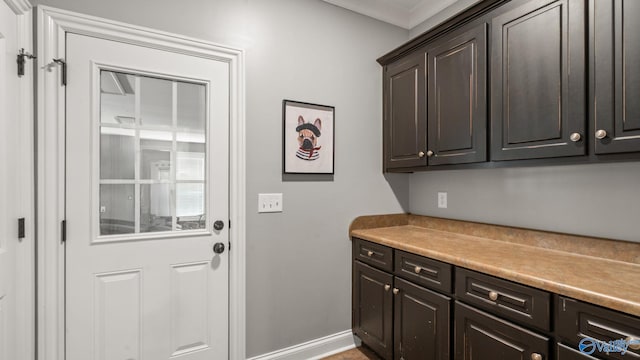1943 Old Big Cove Rd SE, Owens Cross Roads, AL 35763 - washroom with baseboards and ornamental molding