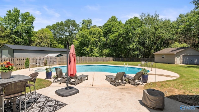 1943 Old Big Cove Rd SE, Owens Cross Roads, AL 35763 - view of swimming pool with a patio area, an outbuilding, and view of scattered trees