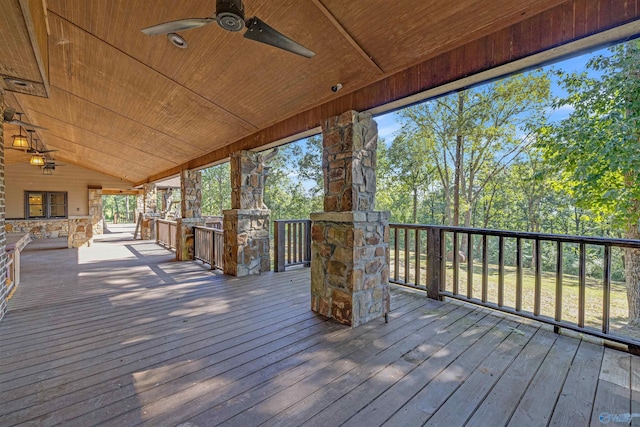 wooden terrace featuring ceiling fan