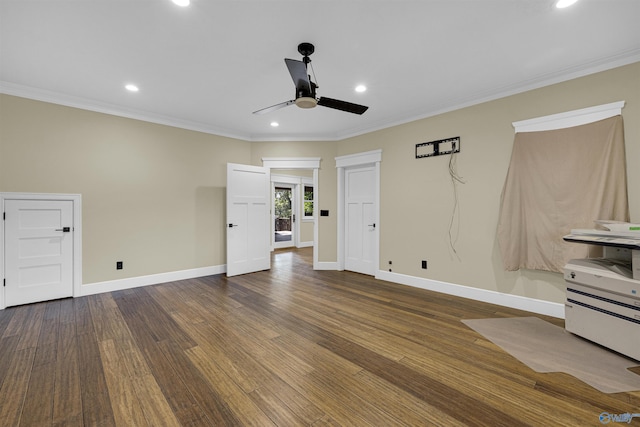 unfurnished living room featuring ceiling fan, dark hardwood / wood-style flooring, and ornamental molding