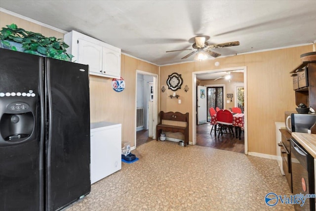 kitchen featuring stainless steel appliances, ceiling fan, crown molding, white cabinets, and hardwood / wood-style floors