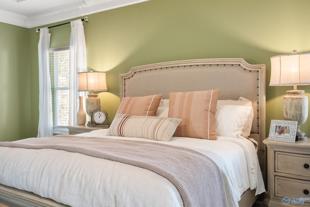 bedroom featuring crown molding