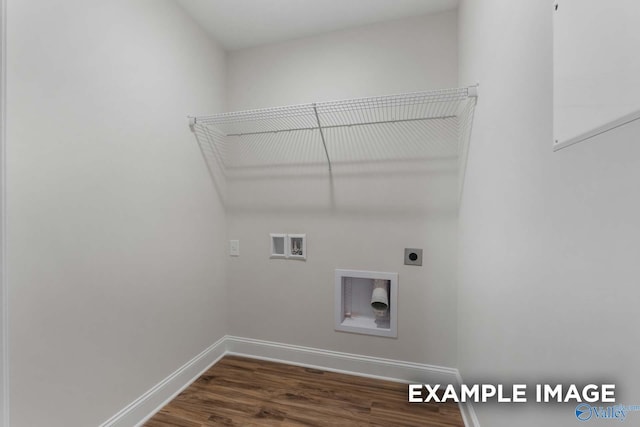clothes washing area with wood finished floors, laundry area, electric dryer hookup, washer hookup, and baseboards