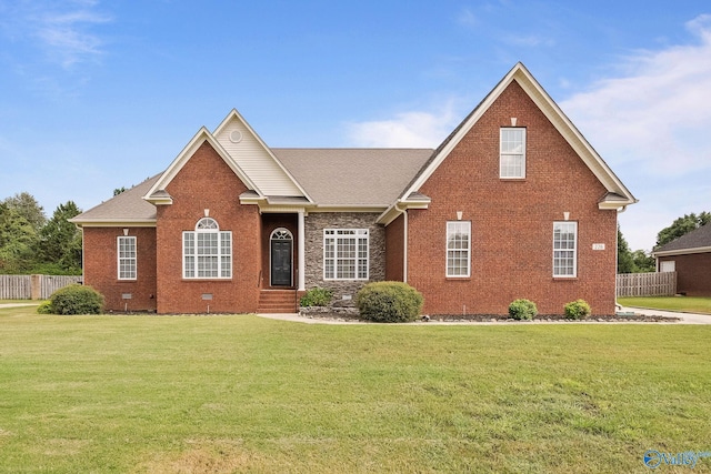 view of front of home with a front lawn