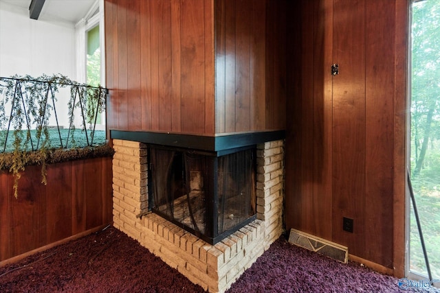10101 Westleigh Dr, Huntsville, AL 35803 - detailed view of carpet flooring, wood walls, and a fireplace