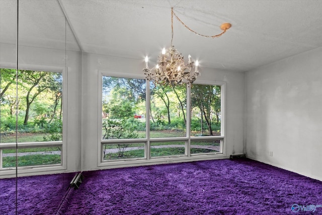 10101 Westleigh Dr, Huntsville, AL 35803 - unfurnished dining area with a chandelier and carpet flooring