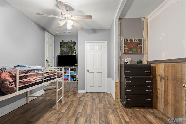 bedroom featuring ceiling fan and hardwood / wood-style flooring