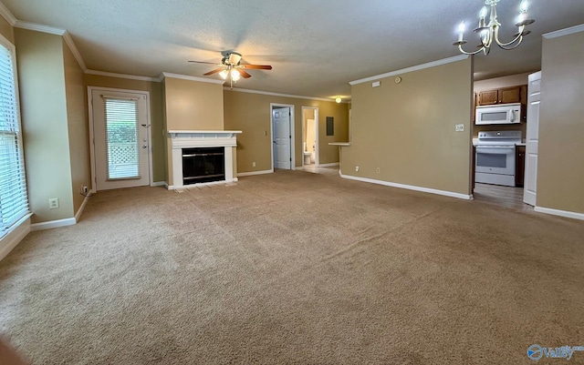 5070 Seven Pine Cir Ground, Unit Ground, Huntsville, AL 35816 - unfurnished living room featuring ceiling fan, ornamental molding, baseboards, a chandelier, and a glass covered fireplace