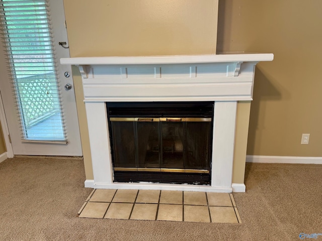 5070 Seven Pine Cir Ground, Unit Ground, Huntsville, AL 35816 - detailed view of carpet, baseboards, and a glass covered fireplace